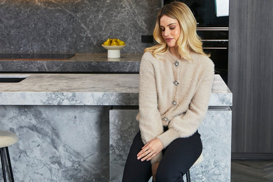 Bold Botanicals: Expressive colour meets structured coats and tactile knitwear.